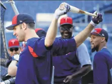  ?? Frank Franklin II / Associated Press ?? Minnesota’s Joe Mauer stretches during a workout at Yankee Stadium. Mauer is the only holdover from the 2010 Twins, the last Minnesota team to make it to the postseason.