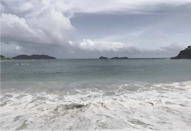  ??  ?? 0 Dark clouds gather over the Caribbean as a string of islands prepare for the landfall of Hurricane Irma, estimated to be the strongest Atlantic storm since Rita in 2005