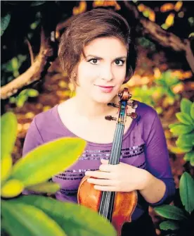  ??  ?? Violinist Ioana Cristina Goicea says the cruise ship was a holiday where she also practised and played concerts and discovered “amazing places”.
