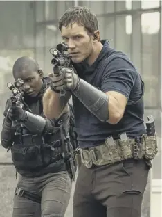  ??  ?? 0 Chris Pratt and Edwin Hodge in The Tomorrow War. Picture: PA Photo/amazon Studios