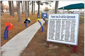  ?? STACI VANDAGRIFF/THREE RIVERS EDITION ?? A sign thanking the sponsors for the new sensory walk at Berryhill Park in Searcy is on display near the beginning of the trail.