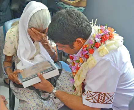  ?? Photo: Shratika Naidu ?? Acting Prime Minister and Attorney-General Aiyaz Sayed-Khaiyum was in tears himself when Isardei cried while receiving the Girmit Centennial award during the celebratio­n at the Labasa Civic Centre yesterday.