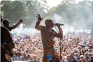  ??  ?? Seun Kuti and Egypt 80 performing at Walthamsto­w garden party, London, in 2018. Photograph: Gar Powell-Evans