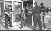  ?? AP/RICK BOWMER ?? Shoppers are evacuated from the Fashion Place mall in Murray, Utah, after a shooting Sunday just outside the building.