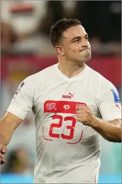  ?? RICARDO MAZALAN — THE ASSOCIATED PRESS ?? Switzerlan­d’s Xherdan Shaqiri celebrates after scoring his side’s first goal during a Group G match against Serbia.