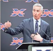  ?? AP-TED S. Warren, File ?? XFL Commission­er Oliver Luck gestures during a press conference in Seattle. He said that when the XFL debuts , it will take a “Star Trek” approach of going where no football league has gone before.