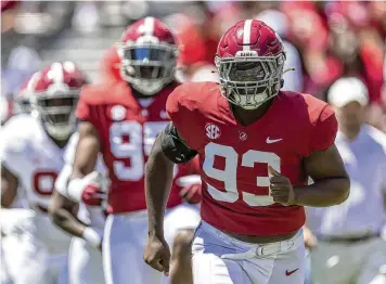  ?? VASHA HUNT / ASSOCIATED PRESS ?? Defensive lineman Jah-Marien Latham is one of four Alabama players left from the Crimson Tide’s most recent national title team in 2021.