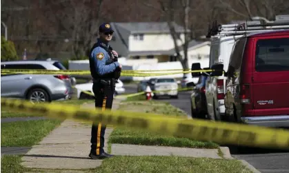  ?? Photograph: Matt Rourke/AP ?? Police respond to a shooting in Levittown, Pennsylvan­ia, on 16 March.