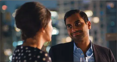  ?? The Associated Press ?? DESERVED RECOGNITIO­N: Aziz Ansari in a scene from "Master of None." Ansari, Donald Glover and Issa Rae are among those who star in shows they also created or co-created, write and sometimes even direct. In return they could reap Emmy nomination­s in a...