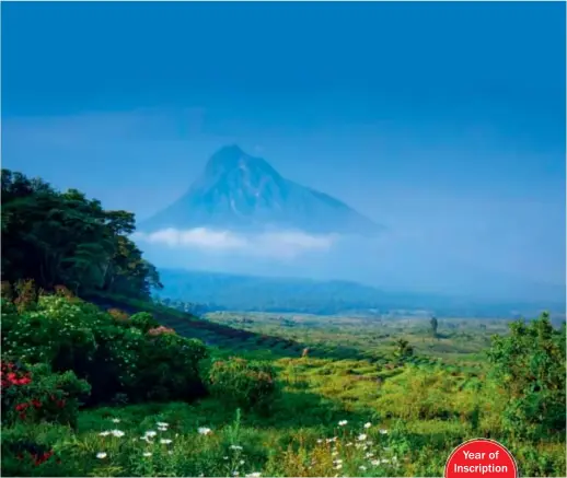  ??  ?? A view of a volcano in the Virunga National Park