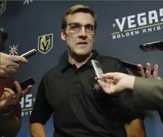  ?? JOHN LOCHER, THE ASSOCIATED PRESS ?? The NHL’s new team, Vegas Golden Knights, will be drafting unprotecte­d players from other teams. General manager George McPhee, from Guelph, speaks during a news conference Monday in Las Vegas.