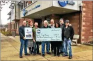  ?? SUBMITTED PHOTO — SAFE BERKS ?? Members of Heaven’s Thunder Band of Boyertown visited Safe Berks on Jan. 28 and delivered a check for nearly $4,200 to help renovate the Playground. From left, band members Randy Graber, Janelle and Guy Detweiler, Mark Malizzi, Keith Morris; Safe Berks...