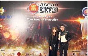  ??  ?? With his mother Liow Yuh Lan at the 8th Asean Outstandin­g Business Awards last year when he received the Asean Leading Emerging Violinist Performer 2017 award.