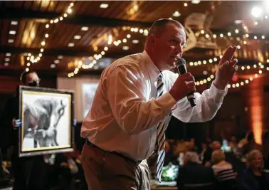  ?? Photos by Matthew Busch / Contributo­r ?? Auctioneer Troy Black calls out bids at the Briscoe Western Art Museum. The museum raised $440,000-plus at the March 27 auction. An online auction brought the total to about $1 million.