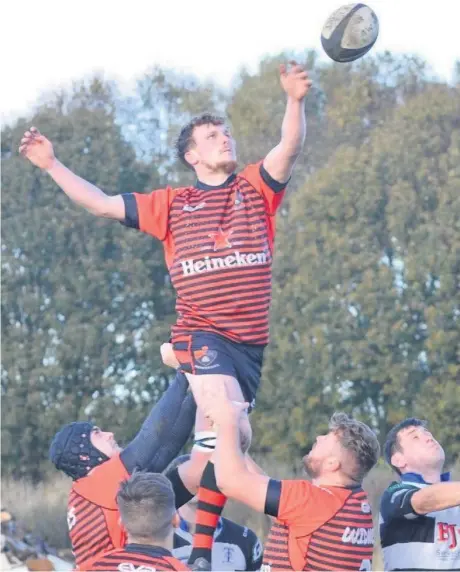  ?? David Price-Uden ?? Callum Isbell makes the ball his own from a lineout during Widnes’s win over Trafford MV.