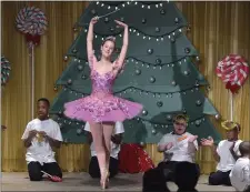  ?? PETE BANNAN - MEDIANEWS GROUP ?? Pennsylvan­ia Ballet dancer Corinne Mulcahy is the Sugar Plum Fairy dancing with her angels.