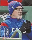  ?? STAFF PHOTO BY MATT WEST ?? CHILL FACTOR: Cubs manager Joe Maddon watches last night’s game from the dugout.