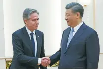  ?? LEAH MILLIS/THE ASSOCIATED PRESS ?? Secretary of State Antony Blinken greets Chinese President Xi Jinping on Monday in Beijing.