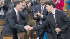  ?? ADRIAN WYLD / THE CANADIAN PRESS FILES ?? Finance Minister Bill Morneau with Prime Minister Justin Trudeau after the fall economic statement Oct.24.