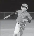  ?? Photos contribute­d by
Gail Conner ?? RIGHT: Jerry Simmons rounds third base and heads toward home.