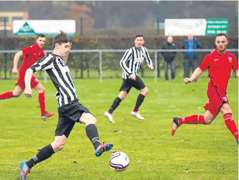  ??  ?? Jeanfield lost 3-2 at home to Hermes (red) in the Scottish Cup last week at the Riverside Stadium.