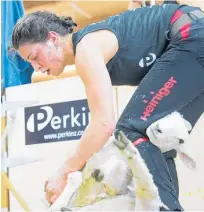  ?? Photo / Otago Daily Times ?? Megan Whitehead on her way to beating Emily Welch confidentl­y works towards a new world record yesterday.