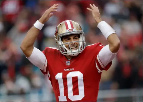  ??  ?? San Francisco 49ers quarterbac­k Jimmy Garoppolo celebrates during game against the Jacksonvil­le Jaguars in Santa Clara on Sunday. AP Photo/MArCIo JoSe SAnChez