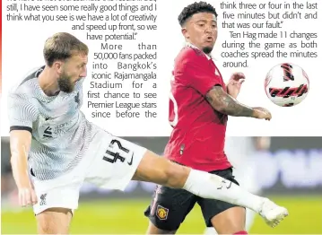  ?? AP ?? Liverpool’s Nat Philips (left) fights for the ball with Manchester United’s Jadon Sancho during their pre-season match at Rajamangal­a national stadium in Bangkok yesterday. Manchester United beat Liverpool 4-0.