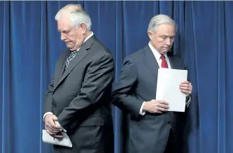  ?? MARK WILSON/GETTY IMAGES ?? Secretary of State Rex Tillerson, left, and Attorney General Jeff Sessions take part in a news conference announcing U.S. President Donald Trump’s reconstitu­ted travel ban in Washington, D.C., on Monday.