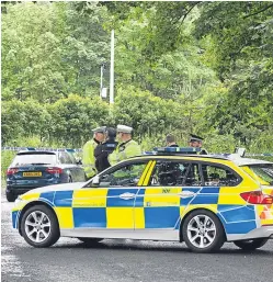  ?? Pictures: Steven Brown. ?? Police were called to the Gleneagles Hotel in Perthshire yesterday after a gang of four armed men threatened staff at the hotel’s jewellery shop at knifepoint before making off with watches worth several thousand points. The Audi getaway car was later...