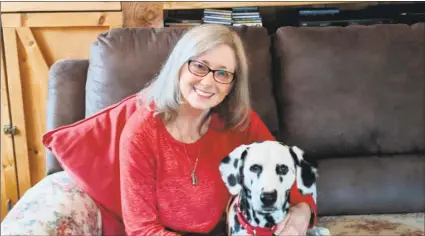  ?? Sloan Brewster photo ?? Connie Bombaci, a Killingwor­th resident and the author of “Hogan’s Hope: A Deaf Hero’s Inspiratio­n and Quest for Love and Acceptance,” has had several deaf dogs, including Judea, a 7-year-old Dalmatian.