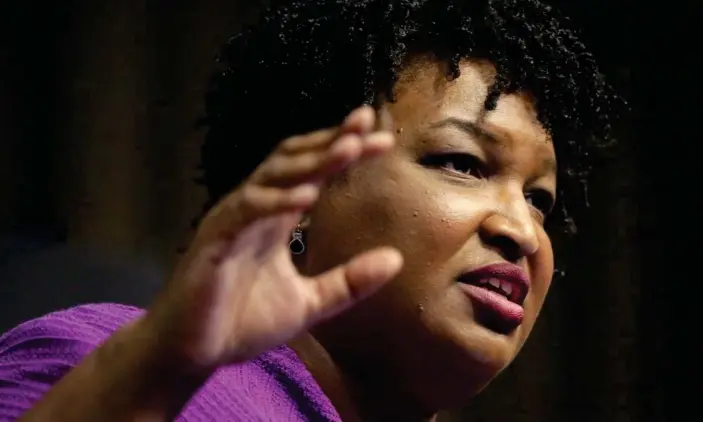  ??  ?? Stacey Abrams said on CNN’s State of the Union on Sunday: ‘I do absolutely agree that it’s racist. It is a redux of Jim Crow in a suit and tie.’ Photograph: Seth Wenig/AP