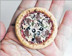  ?? CONTRIBUTE­D ?? This pizza, according to Tracey Rozee-Sirrat, is created much like cooking happens — one ingredient at a time.