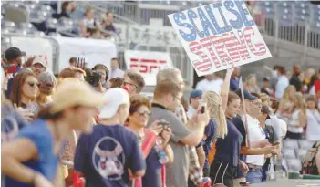  ?? — Reuters ?? A Republican supporter holds up a sign supporting Steve Scalise before the Democrats and Republican­s faced off in the annual Congressio­nal Baseball Game at Nationals Park in Washington.