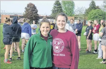  ?? CHARLES REID/THE GUARDIAN ?? Marshfield’s Emily Keen, left, and Souris native Rebecca Chapman and the rest of the Charlottet­own Rugby Football Club begin defence of its Nova Scotia Senior Women’s Rugby League Tier A title today against Halifax RFC as the season opens in Truro, N.S.