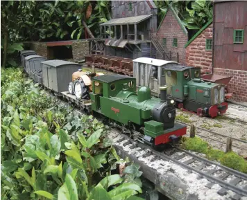  ??  ?? The train winds its way down and up the line, shunting wagons off and on dependent on the requiremen­ts of the manifest. Here we see ex-Southwold Railway Manning Wardle loco No. 4 Bulkeley passing the Copper Mine.