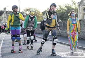  ??  ?? A colourful funeral procession took place in Corsham as friends and family celebrated the life of roller derby player Amy Buller, below