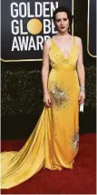  ?? Jordan Strauss / Associated Press ?? Claire Foy in Miu Miu