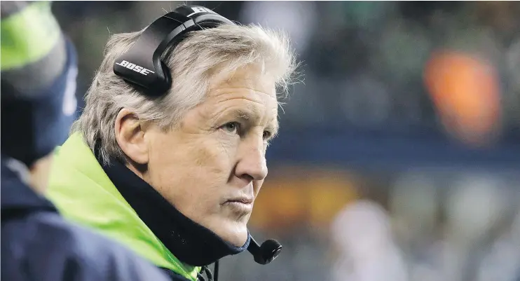  ?? — AP FILES ?? Seattle head coach Pete Carroll regularly shared informatio­n with John Lynch, the former TV pundit who went on to join the San Francisco 49ers’ front office.