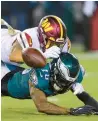  ?? FILE ?? Eagles wide receiver Quez Watkins fumbles after making a catch Monday in Philadelph­ia.