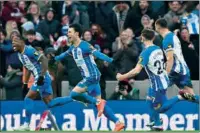  ?? (AFP) ?? Brighton’s Japanese midfielder Kaoru Mitoma (centre) celebrates with teammates after scoring their second goal during the English FA Cup fourth round match against Liverpool at the Amex stadium in Brighton on Sunday.