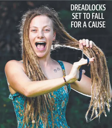  ?? ?? Brinsmead woman Montana Purtle is shaving off her dreadlocks that she has grown for 10 years, with the money raised going to the Leaukaemia Foundation. Picture: Brendan Radke