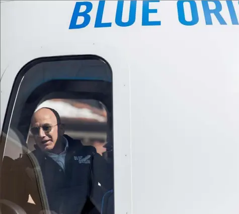  ?? Nick Cote/The New York Times ?? Jeff Bezos, founder of Blue Origin and Amazon, speaks from inside Blue Origin’s New Shepard space system in Colorado Springs, Colo., in 2017.