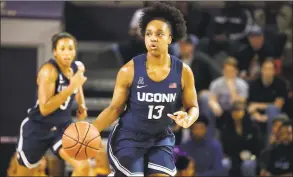  ?? Karl B DeBlaker / Associated Press ?? UConn’s Christyn Williams brings the ball up the court against East Carolina during a game in January.