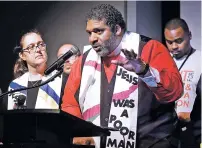  ?? MARK HUMPHREY/ASSOCIATED PRESS ?? The Revs. William J. Barber II, center, and Liz Theoharis, left, co-chairs of the Poor People’s Campaign, speak April 2 at the National Civil Rights Museum in Memphis, Tenn. The organizati­on is the rekindling of the campaign that the Rev. Dr. Martin Luther King Jr. was working on when he was killed April 4, 1968, in Memphis.