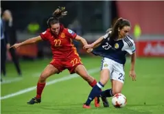  ??  ?? Chloe Arthur, right, playing for Scotland (Getty)