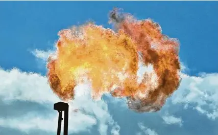  ?? Eddie Seal / Bloomberg ?? The Railroad Commission of Texas is consdering a matrix of proposals that would cut the number of days flaring can occur before companies must seek a permit.