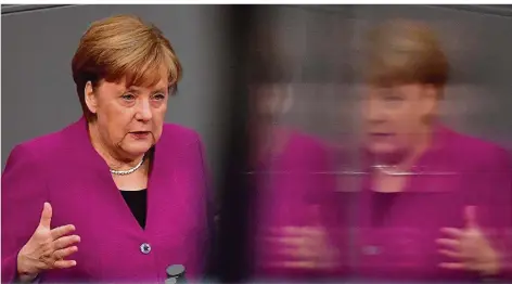  ?? FOTO: MACDOUGALL/AFP ?? Deutschlan­d gehe es nur gut, wenn es Europa gut gehe, lautete der Appell der Kanzlerin im Bundestag – vor dem heutigen EU-Gipfel in Brüssel.