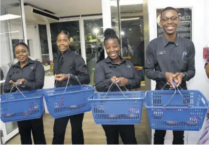  ?? ?? Servers (from left) Kadian Brown, Janice Parkes, Fiona Palmer, and Akeem Mckenzie