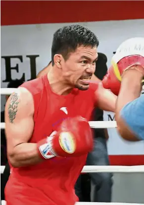  ??  ?? In the spotlight: Philippine boxing icon Manny Pacquiao (left) will be fighting Argentinia­n Lucas Matthysse in the main bout while Malaysia’s Theena Thayalan (right) will take on India’s Siddharth Varma in a support fight at the Axiata Arena in Bukit...